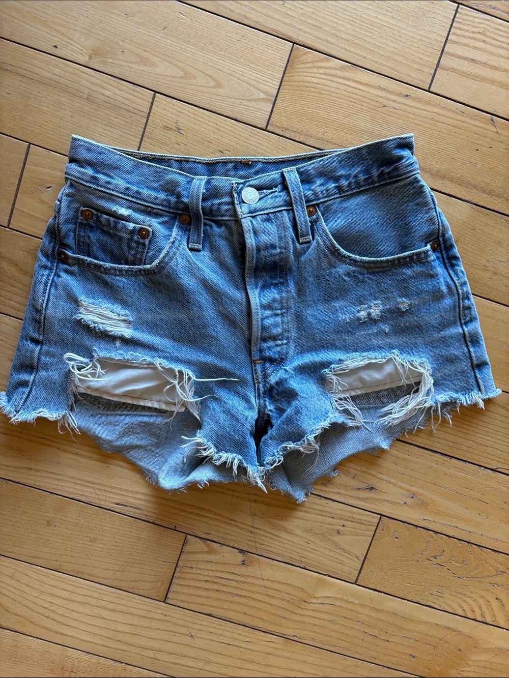 Levi's 501 Light Blue Distressed Denim Cutoff Shorts